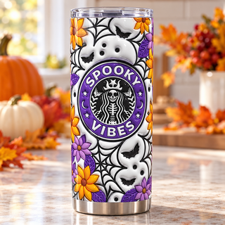 Spooky Vibes coffee parody with flowers and webs — one tumbler in kitchen setting