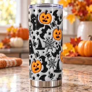 Ghosts, jack-o-lanterns and witch hats on gray — one tumbler in kitchen setting