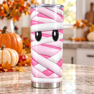 Pink mummy bandages and eyes — one tumbler in kitchen setting