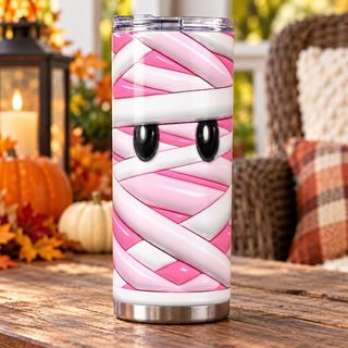 Pink mummy bandages and eyes — one tumbler in porch setting