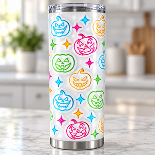Multicolored outline jack-o-lanterns on white — single tumbler on a kitchen countertop