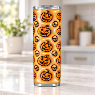 Jack-o-lanterns and skulls on tan — single tumbler on kitchen counter