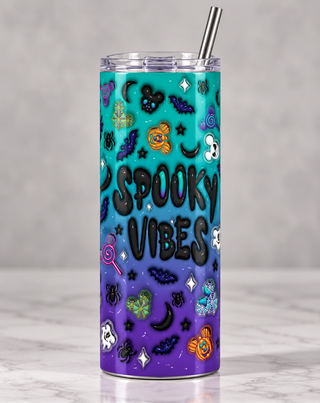Spooky Vibes: Halloween icons on teal-purple — studio mockup of one 20 oz skinny stainless steel tumbler