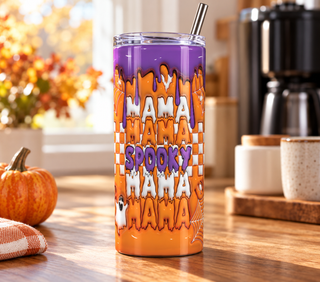Spooky Mama repeated lettering on orange checkerboard — 20 oz skinny stainless steel tumbler in a home kitchen lifestyle mockup