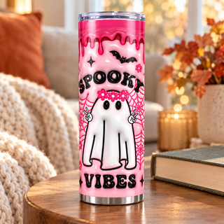 Illustrative lifestyle mockup of Spooky Vibes: ghost, flowers and pink webs | Halloween Sublimation Tumbler. Finished item may vary slightly.