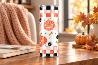 Illustrative lifestyle mockup of the pink and coral pumpkin stainless steel tumbler in a desk setting. Finished item may vary slightly.