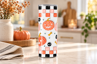 Illustrative lifestyle mockup of the pink and coral pumpkin stainless steel tumbler in a kitchen setting. Finished item may vary slightly.