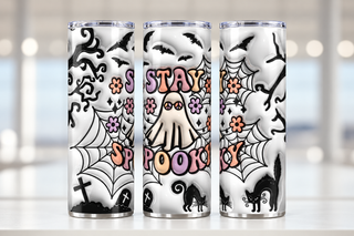 Stay Spooky: ghost, flowers and black Halloween silhouettes — three views of one stainless steel tumbler