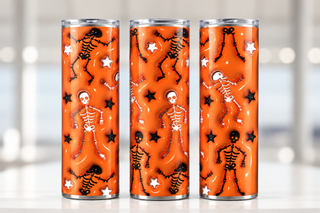 Dancing skeletons on orange — three views of one stainless steel tumbler