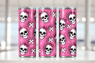 Skulls with pink bows and crossbones — three views of one stainless steel tumbler