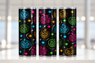 Multicolored outline jack-o-lanterns on black — three views of one stainless steel tumbler