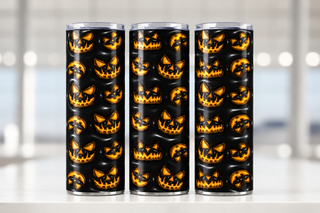 Orange jack-o-lantern faces on black — three views of one stainless steel tumbler