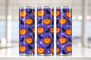 Jack-o-lanterns and bats on blue-purple — three views of one stainless steel tumbler