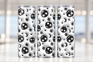 Black smiling ghosts and moons on white — three views of one stainless steel tumbler