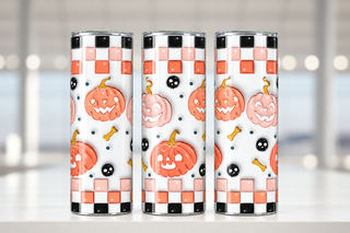 Illustrative mockup showing three views of one pink and coral jack-o'-lantern Halloween tumbler. One tumbler per purchase.